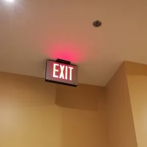 Exit sign installed at a library in the U.S.
