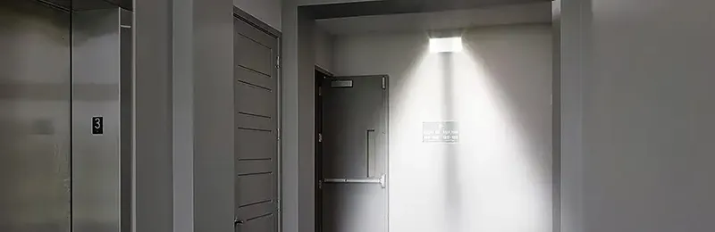 LE297 Edge-Lit LED Exit Sign with ABS/Acrylic Panel (5 Green LEDs)